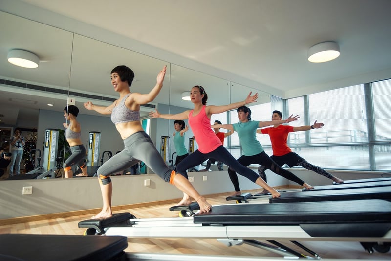 Woman practicing barre for core strength